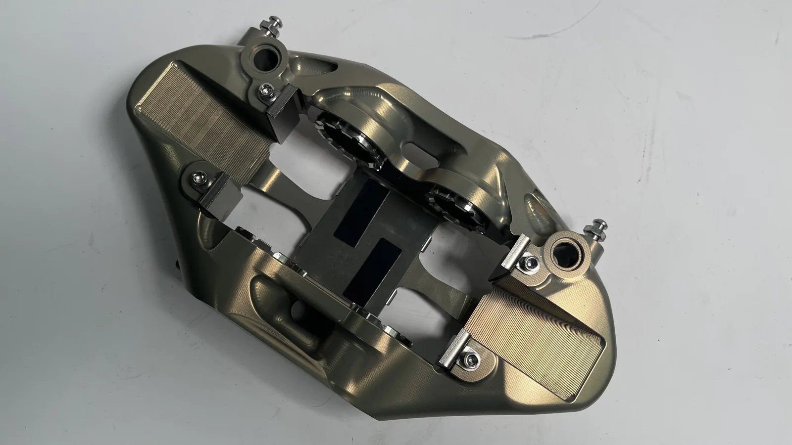 NH-4 from the disc side, the pad and pistons visible